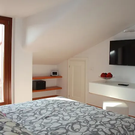 Deliziosa Mansarda Ferienhaus *